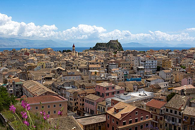 Corfu in Greece - View from the New Fortress over the Old Town of Kerkyra, with the Old Fortress rising in the background and the mainland visible in the distance
