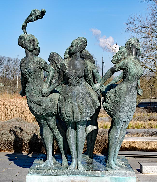 Rostock - Sculpture Seven Proud Sisters Kiss One Sea by Artist Reinhard Dietrich (1970) on a square near the gate