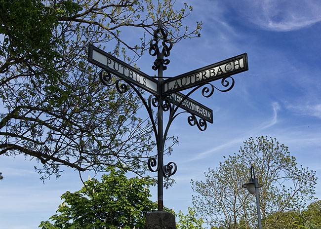 Rügen - Signpost on the road from the harbor to Putbus
